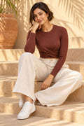 Twist Front Rib Crop Top in Emboldened – seated on steps