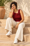 Twist Shoulder Rib Top in Emboldened – seated on steps